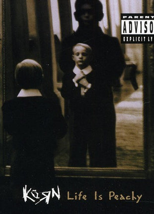 the album cover for Korn - Life Is Peachy