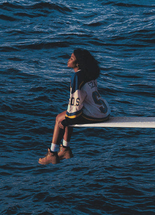 the album cover for SZA - SOS