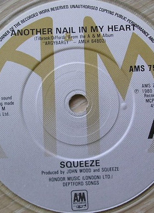 Squeeze (2) : Another Nail In My Heart (7", Single, Cle)