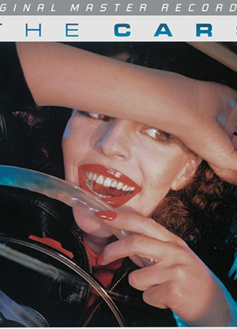 the album cover for The Cars - The Cars