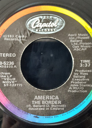 America (2) : The Border (7", Single, Win)