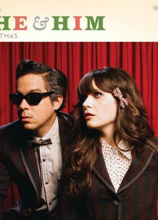 the album cover for She & Him - A Very She and Him Christmas
