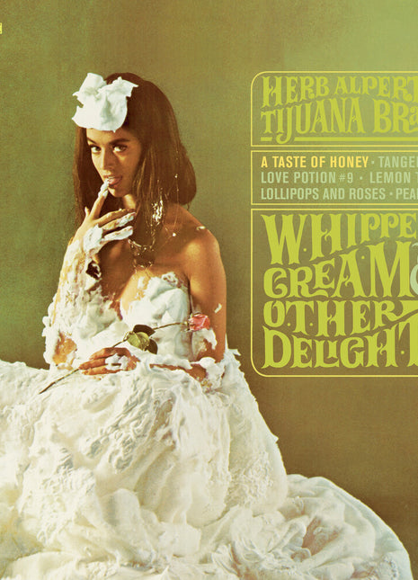 the album cover for Herb Alpert - Whipped Cream & Other Delights