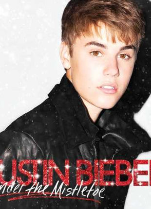 the album cover for Justin Bieber - Under The Mistletoe