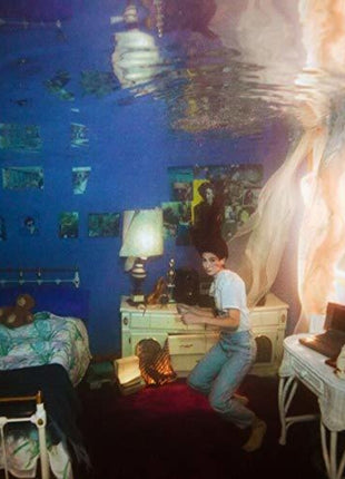 the album cover for Weyes Blood - Titanic Rising