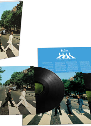the album cover for The Beatles - Abbey Road: Anniversary Edition [Deluxe 3LP]
