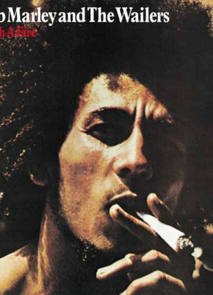 the album cover for Bob Marley & The Wailers - Catch A Fire: Original Jamaican Version [Limited Edition LP]