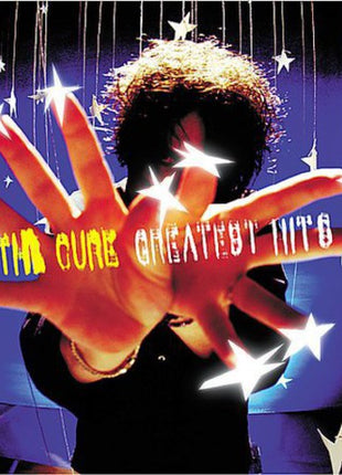 the album cover for The Cure - Greatest Hits