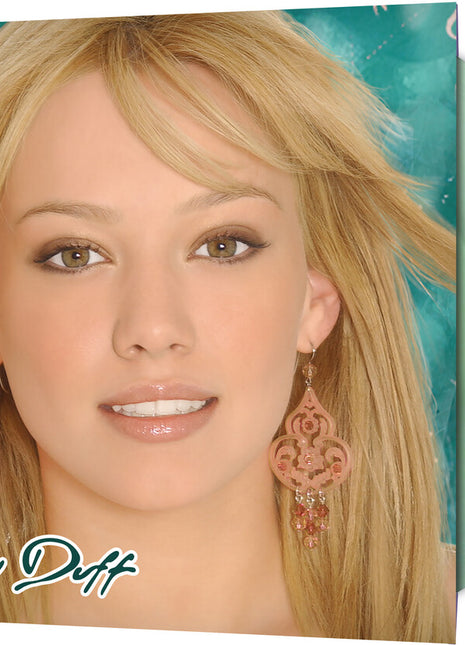 the album cover for Hilary Duff - Metamorphosis [Soda Bottle Clear]