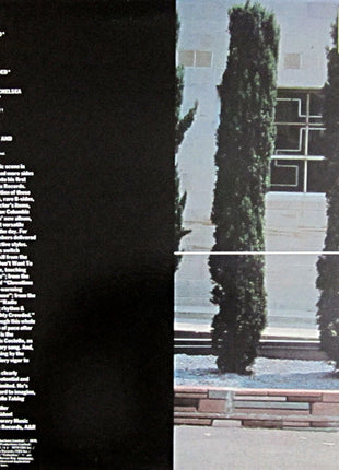 Elvis Costello : Taking Liberties (LP, Comp, San)