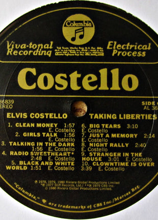 Elvis Costello : Taking Liberties (LP, Comp, San)