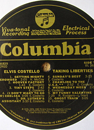 Elvis Costello : Taking Liberties (LP, Comp, San)