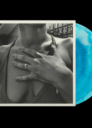 the album cover for The Menzingers - On the Impossible Past - Anniversary Ed. - Baby Blue White Galax