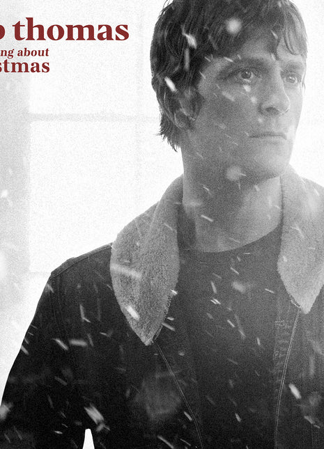 the album cover for Rob Thomas - Something About Christmas Time