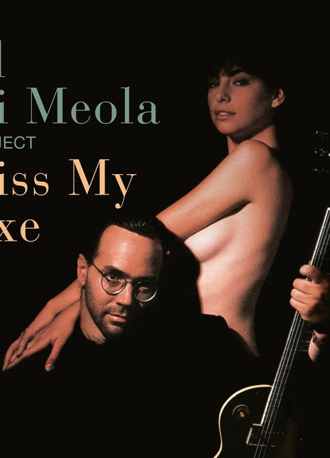 the album cover for Al Di Meola - Kiss My Axe [2LP]