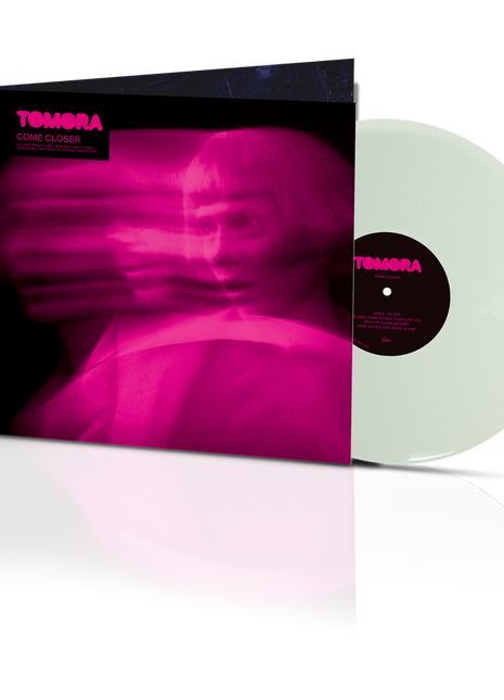 the album cover for Tomora - Come Closer [180 Gram White]