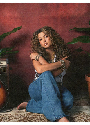 the album cover for Tori Kelly - God Must Really Love Me