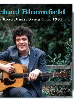 the album cover for Mike Bloomfield - Dark Road Blues: Santa Cruz 1981 [Indie Exclusive Graphite Splatter]