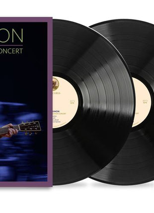 the album cover for Paul Simon - The Quiet Celebration Concert