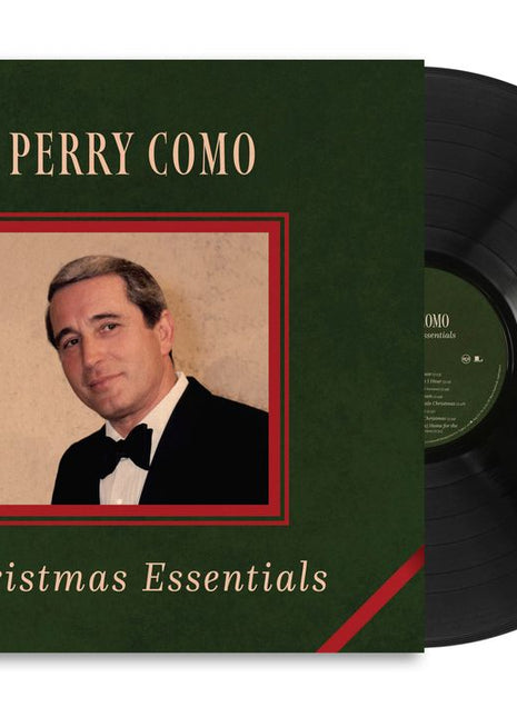the album cover for Perry Como - Christmas Essentials