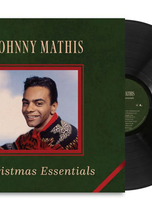 the album cover for Johnny Mathis - Christmas Essentials
