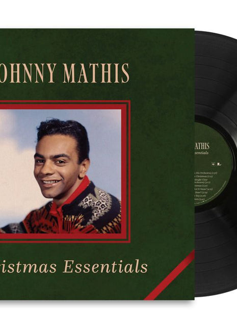 the album cover for Johnny Mathis - Christmas Essentials