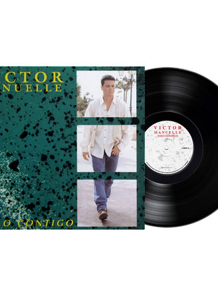 the album cover for Victor Manuelle - Solo Contigo