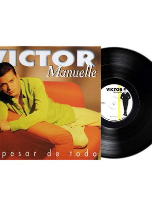 the album cover for Victor Manuelle - A Pesar De Todo