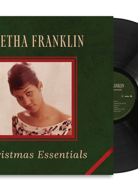 the album cover for Aretha Franklin - Christmas Essentials