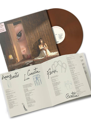 the album cover for Kany Garcia - Puerta Abierta [Brown]