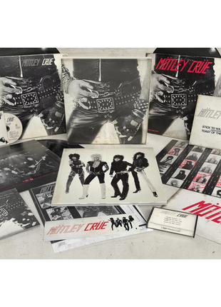 the album cover for Motley Crue - Too Fast for Love - 45th Anniversary Edition [Deluxe Box]