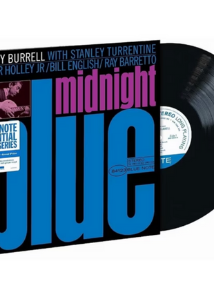 the album cover for Kenny Burrell - Midnight Blue (Blue Note Essentials Series)