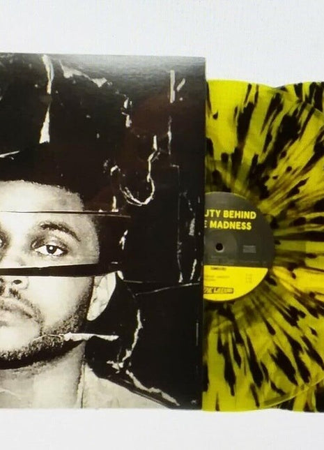the album cover for The Weeknd - Beauty Behind The Madness (Blk) (Ylw) (Can)