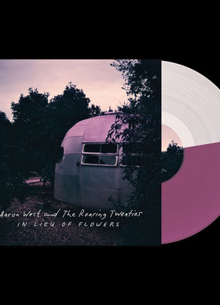 the album cover for Aaron West  & The Roaring Twenties - In Lieu Of Flowers - Purple & Clear Split [Colored Vinyl]