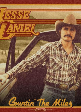 the album cover for Jessie Daniel - Countin' The Miles [Indie Exclusive Limited Edition Autographed, Transparent Camo LP]