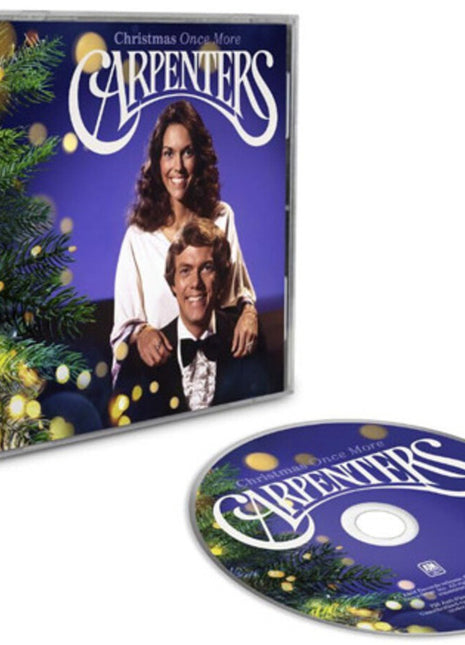 the album cover for Carpenters - Christmas Once More