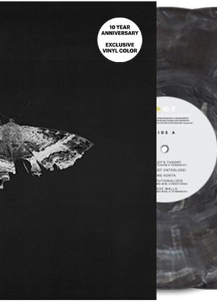 the album cover for Kendrick Lamar - To Pimp A Butterfly (10 Year Anniversary Edition) [Metallic Blends 2LP w/ Alternate Artwork]