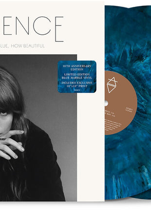the album cover for Florence + The Machine  - How Big, How Blue, How Beautiful (10th Anniversary Edition) -  [Blue Marble 2 LP]