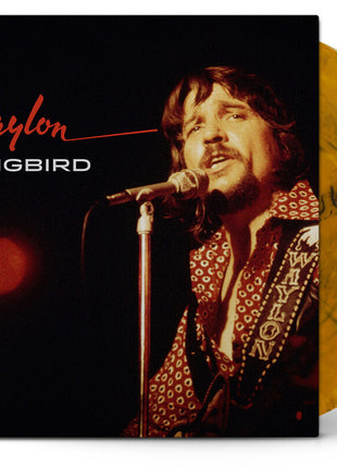 the album cover for Waylon Jennings - Songbird [Indie Exclusive Tigers Eye LP]