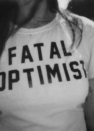 the album cover for Madi Diaz - Fatal Optimist [Indie Exclusive Opaque Turquoise LP]