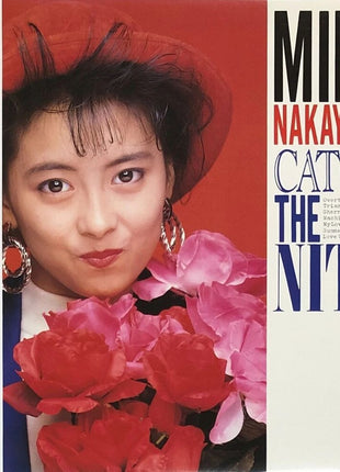 the album cover for Miho Nakayama - Catch The Nite [Clear Blue Vinyl]