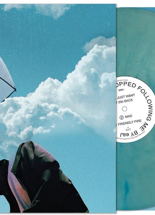 the album cover for Eaj - When The Rain Stopped Following Me [Indie Exclusive Ocean Blue Colored Vinyl]