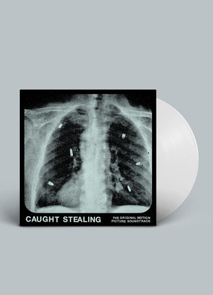 the album cover for IDLES feat. Rob Simonsen - Caught Stealing (The Original Motion Picture Soundtrack)