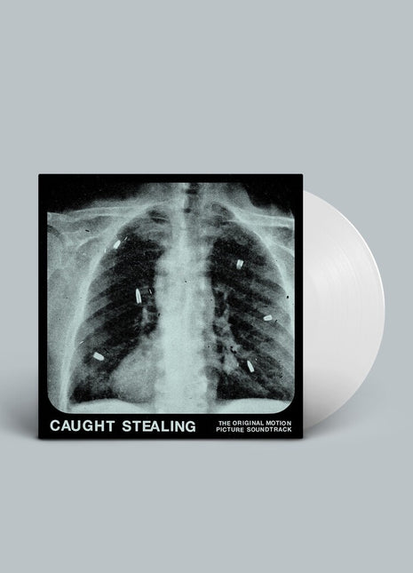 the album cover for IDLES feat. Rob Simonsen - Caught Stealing (The Original Motion Picture Soundtrack)