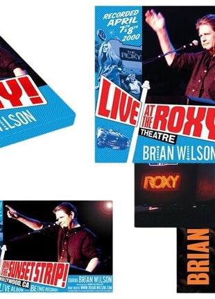 the album cover for Brian Wilson - Live At The Roxy Theatre [Indie Exclusive White + Red & Blue Splatter 140g 3LP]