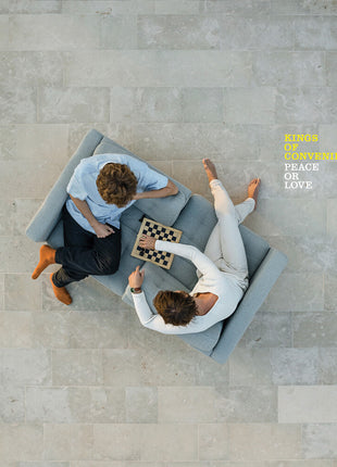 the album cover for Kings Of Convenience - Peace Or Love [Reissue]