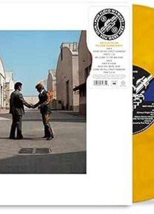 the album cover for Pink Floyd - Wish You Were Here [Yellow Colored Vinyl]