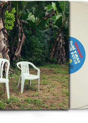 the album cover for Bad Bunny - DEBI TIRAR MAS FOTOS [Opaque White 2LP]