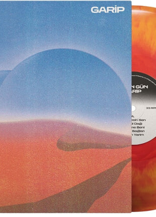 the album cover for Altin Gun - Garip [Indie Exclusive Sunburst Splash]