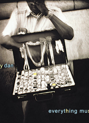 the album cover for Steely Dan - Everything Must Go [Clear Vinyl]